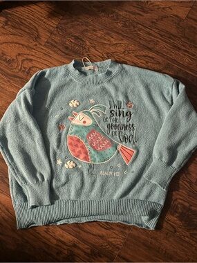 Light Blue Crewneck Sweater with Bird Graphic and Inspirational Text